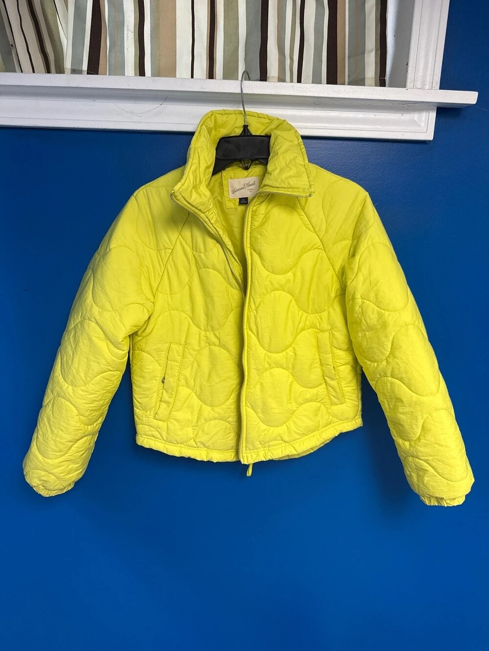 Yellow puffer coat